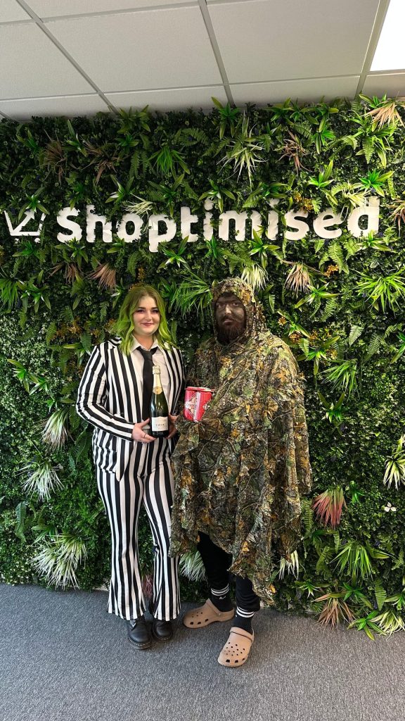 Shoptimised team in Halloween costumes outside the office