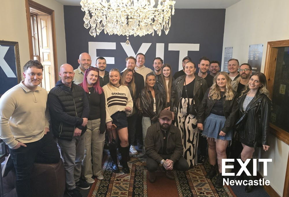 Shoptimised team celebrating after an escape room in Newcastle